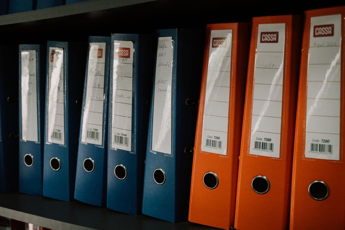 Organised household files and documents — a household organiser brings together insurance, property details, and emergency contacts in one place